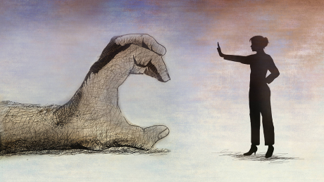 Frau sagt Nein zur greifenden Hand eines Mannes © imago images/Ikon Images