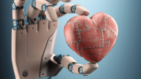 Ein Roboter hält ein Herz in der Hand © imago/Panthermedia