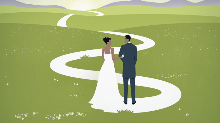 Die Brautschleppe formt den Weg für ein Ehepaar © imago images/Ikon Images