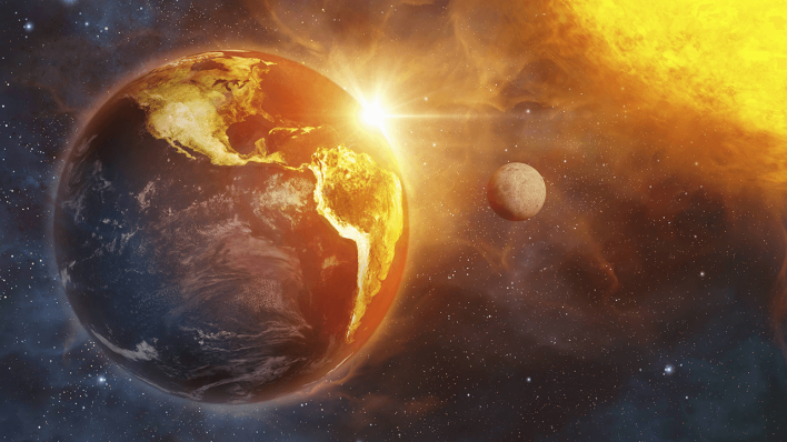 Die Erde wird von der Sonne angestrahlt © imago images/Ikon Images