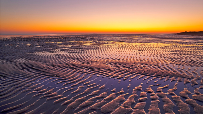 Wattenmeer bei Sonnenaufgang © imago images/blickwinkel