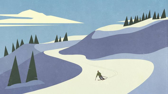 Ein Skifahrer auf einer Piste