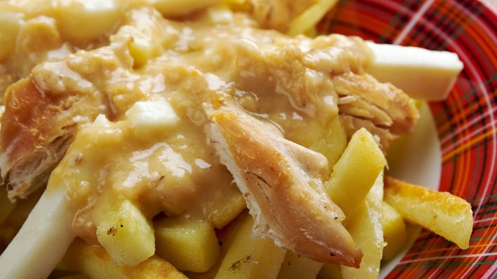 Fritten mit Käse und Bratensoße: Das Kanadische Gericht Poutine © IMAGO / Zoonar