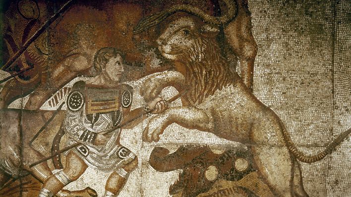 Ein Mosaik zeigt einen Gladiator im Kampf mit einem Löwen